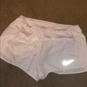 white nike shorts